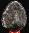 Septarian Dragon Egg Geode - Black Crystals #83217-1